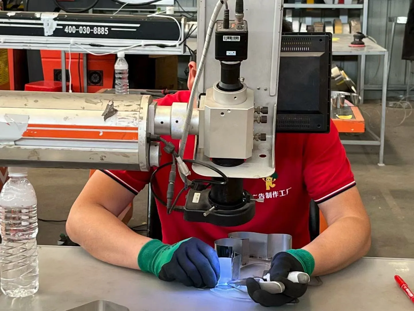 Precision laser welding of a stainless steel sign component